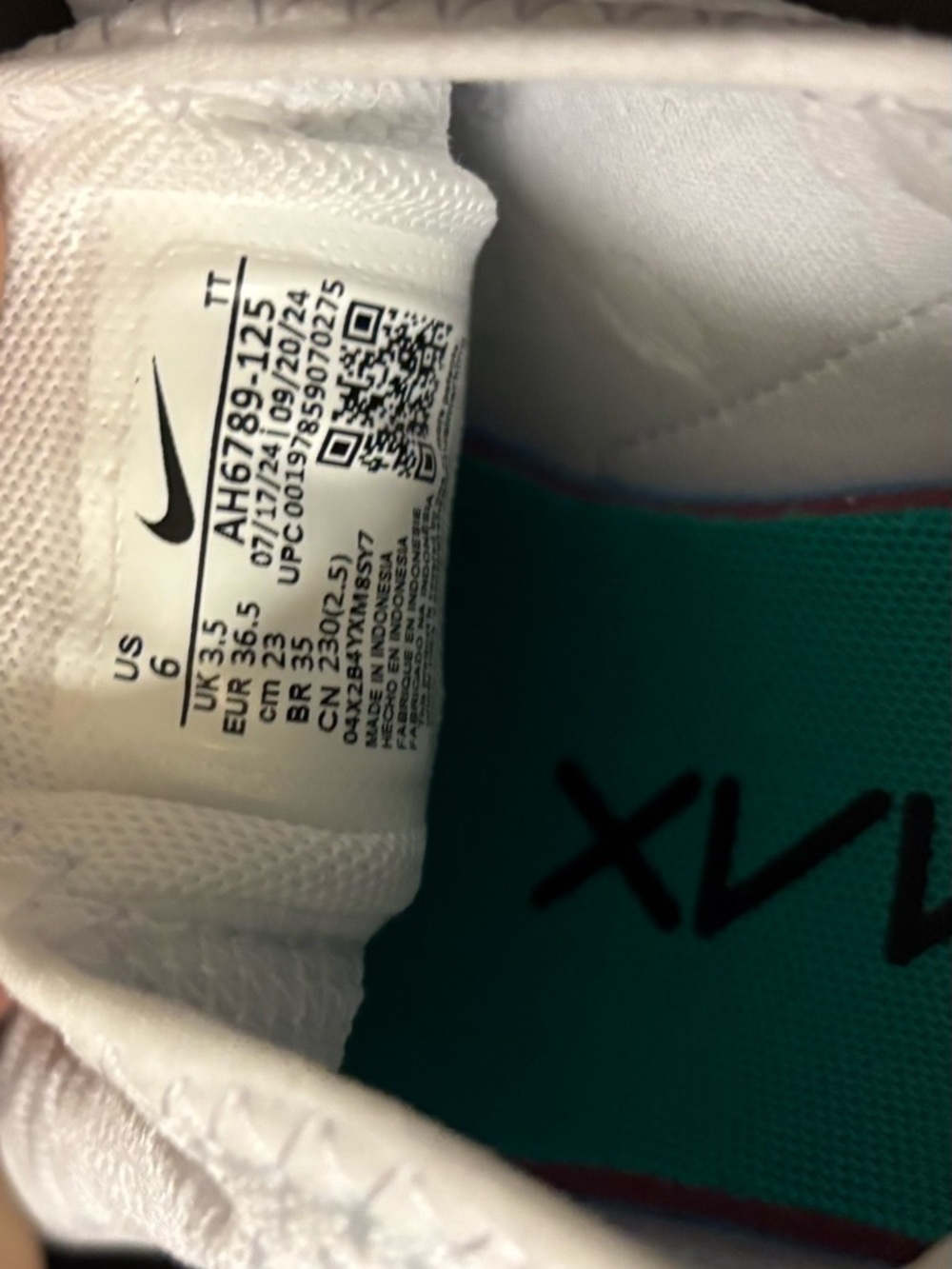 Nike Air Max White Sneakers with Teal Insole and Black Logo